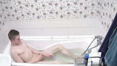 Tearing up the Shower! Horny Teen Porn Boy Flexes in Steamy Action!