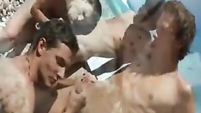 Gay Porn: End of the Holiday Beach Bareback Group Sex