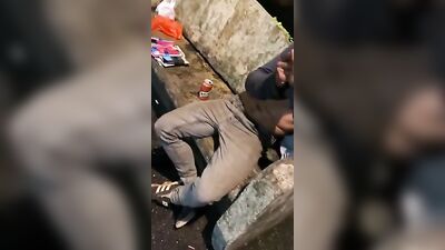 Friends sucking a drunken fit boy in a park