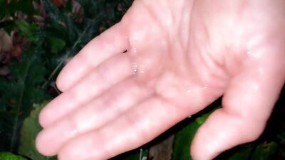 Teen is pushing out cum of his ass and tasting anal creampie outdoor