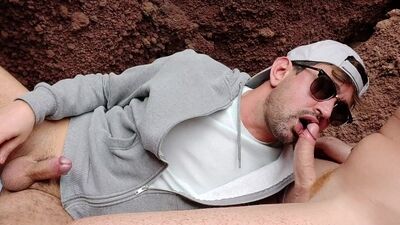 Sucking my red husband on the beach