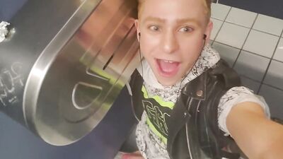 Stranger reaches under stall to grab Daniel Hausser's cock