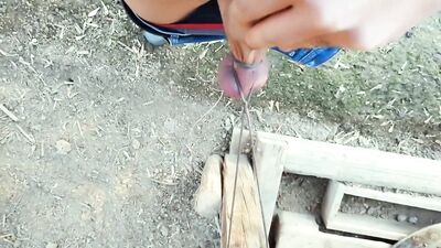 Farmer twink ties his balls , stretches tight balls and jerks off