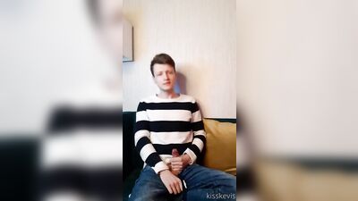 Skinny cutie in jeans jerks off on the couch