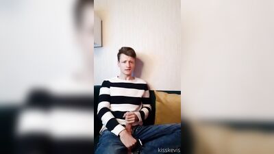 Skinny cutie in jeans jerks off on the couch