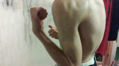 Young Teenboy Twins Flex their Muscles