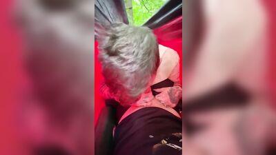 Head in a hammock in a park in broad daylight