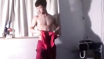 Asian muscular guy (gymnast?)