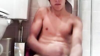 Boy wanks in bathroom