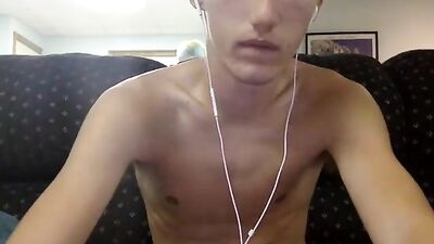 Sexy blond beardless masturbating on the sofa