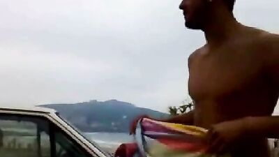Drunk, naked straight guy taking a le*ak in a parking lot!