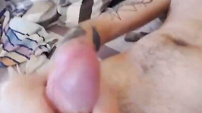 Horny naked guy fingering himself