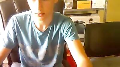 Young and smooth blond masturbating in front of his PC