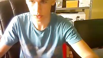 Young and smooth blond masturbating in front of his PC