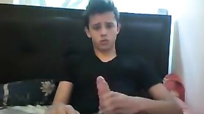 Young and cute he masturbates while smoking his cigarette