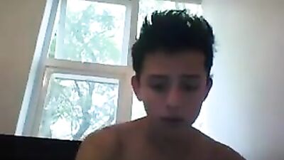 Young and cute he masturbates while smoking his cigarette