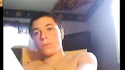 All smooth young boy masturbating behind his desk