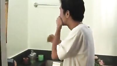 Brunette wanking in the toilet