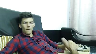 Solo cute young guy wanks thick chunky cock