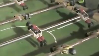 Boys strip table soccer game