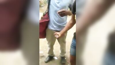 Showing his horse hung dick outside of school