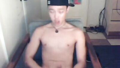 Boy shoots on webcam