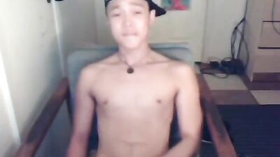 Boy shoots on webcam
