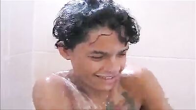 Latin guy taking a shower