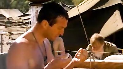 Military are taking a shower outdoors