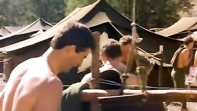 Military are taking a shower outdoors