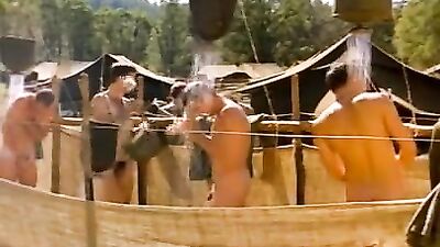 Military are taking a shower outdoors