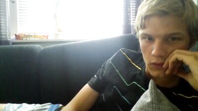 Horny blond boy stroking his big cock