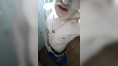 Exotic white twink in shower