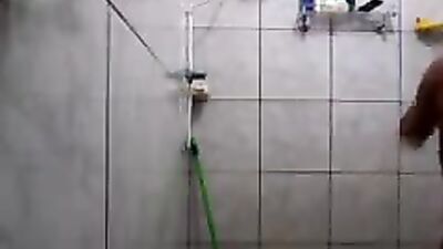 Boy takes a shower and washes well