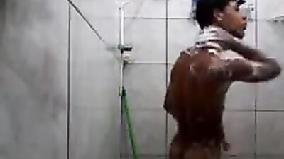 Boy takes a shower and washes well