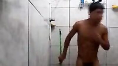 Boy takes a shower and washes well
