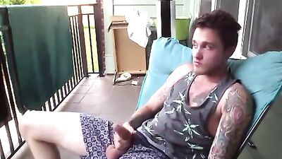 He masturbates on the balcony