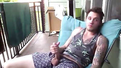He masturbates on the balcony