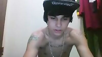 Cute tattooed and smooth he masturbates on his bed