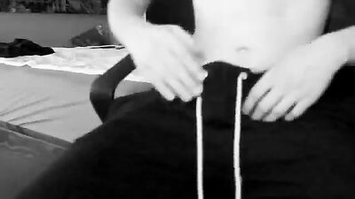 Young smooth pussy masturbates in black and white