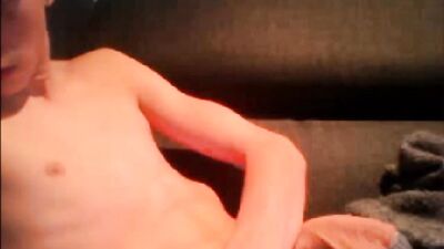 Jerks and cums on couch