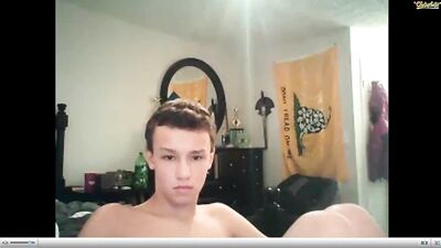 Young and cute getting delicious naked boy on his bed