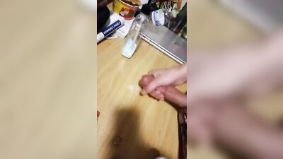 Cumming on his desk