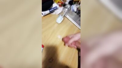 Cumming on his desk