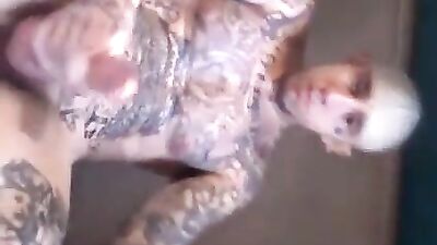 Tattoos all over his body