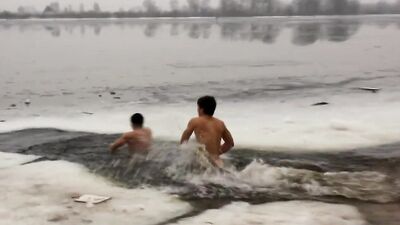 Icy Russians: Blond Boys Diving into the Cold Water