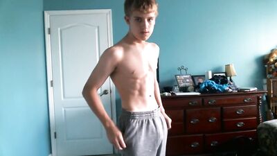 Adorable Blond Teenboy Flexes