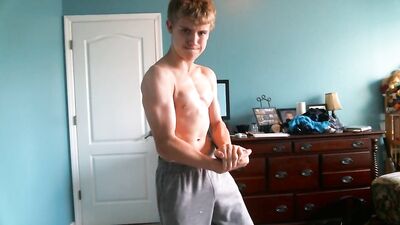 Adorable Blond Teenboy Flexes