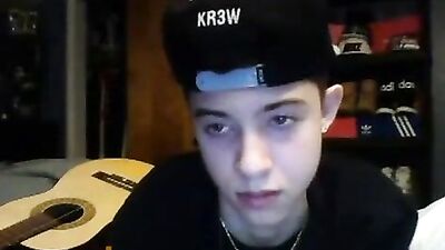 Cute boy teen wanks on bed