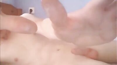 A beautiful blonde naked on her bed masturbating